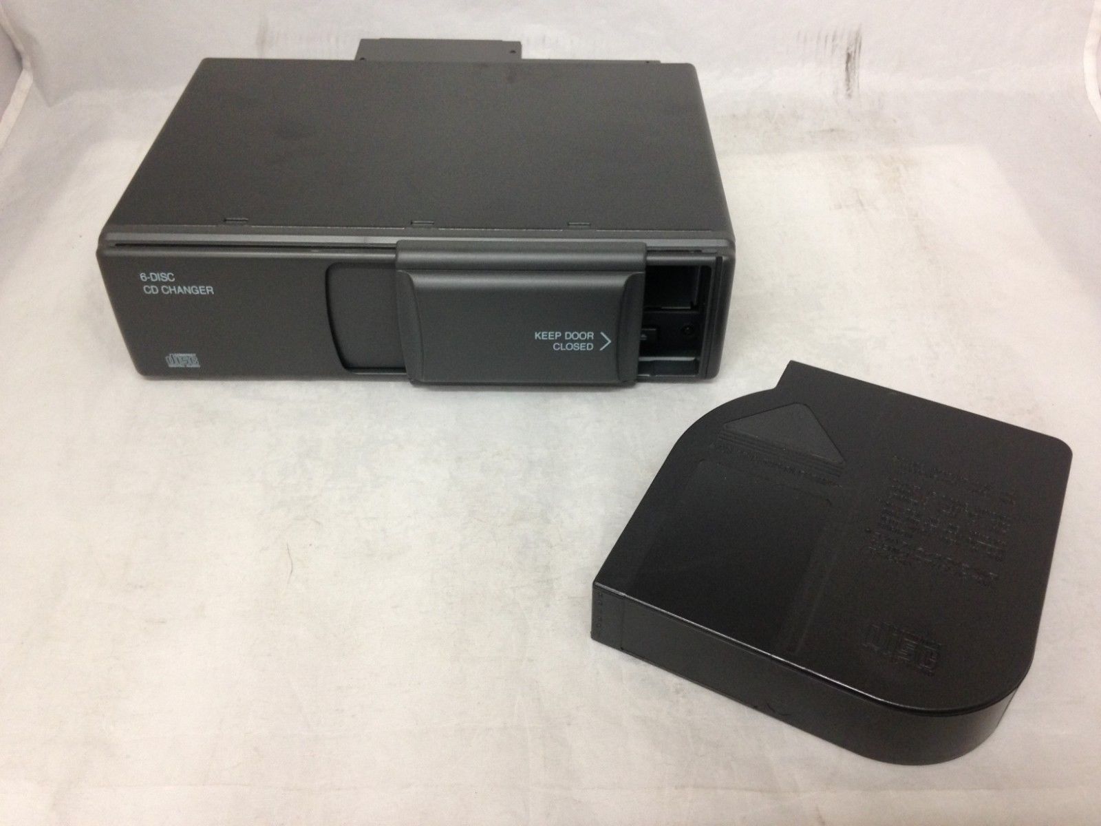 GM remote mounted 6 CD Changer with cartridge NEW