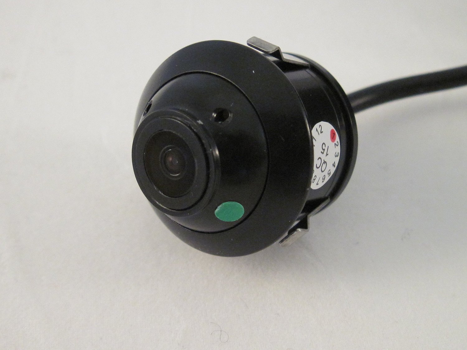 Back-up camera for flush keyhole mounting